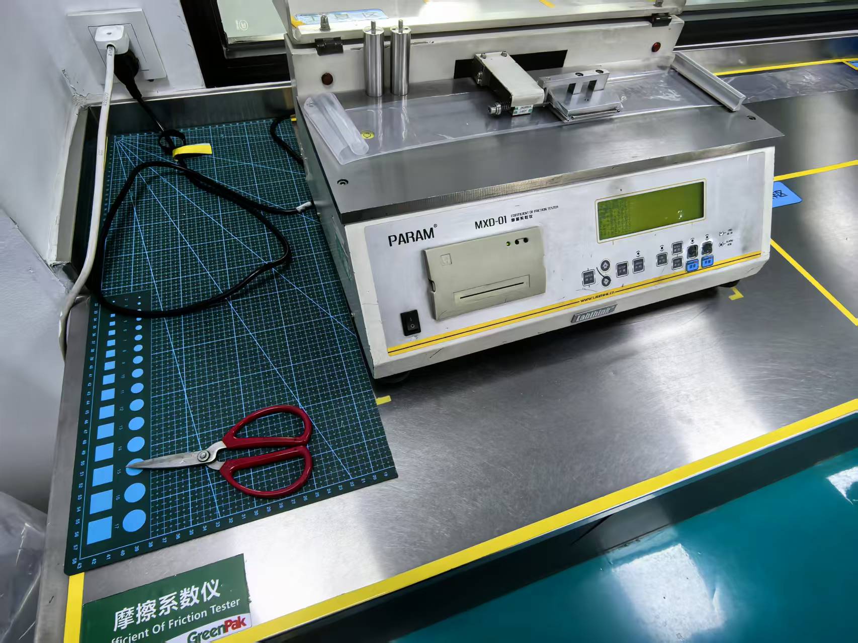 Coefficient of friction tester for flexible packaging quality control